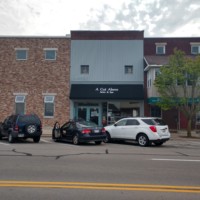 Shed style awning with graphics on deck