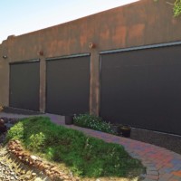 Motorized roller curtains